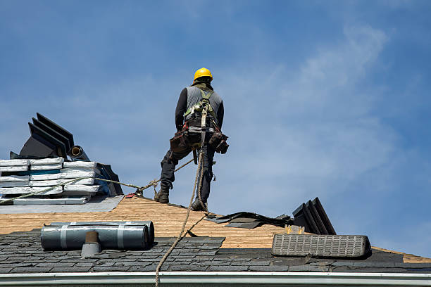 Professional Roofing technician working in Charlton, MA